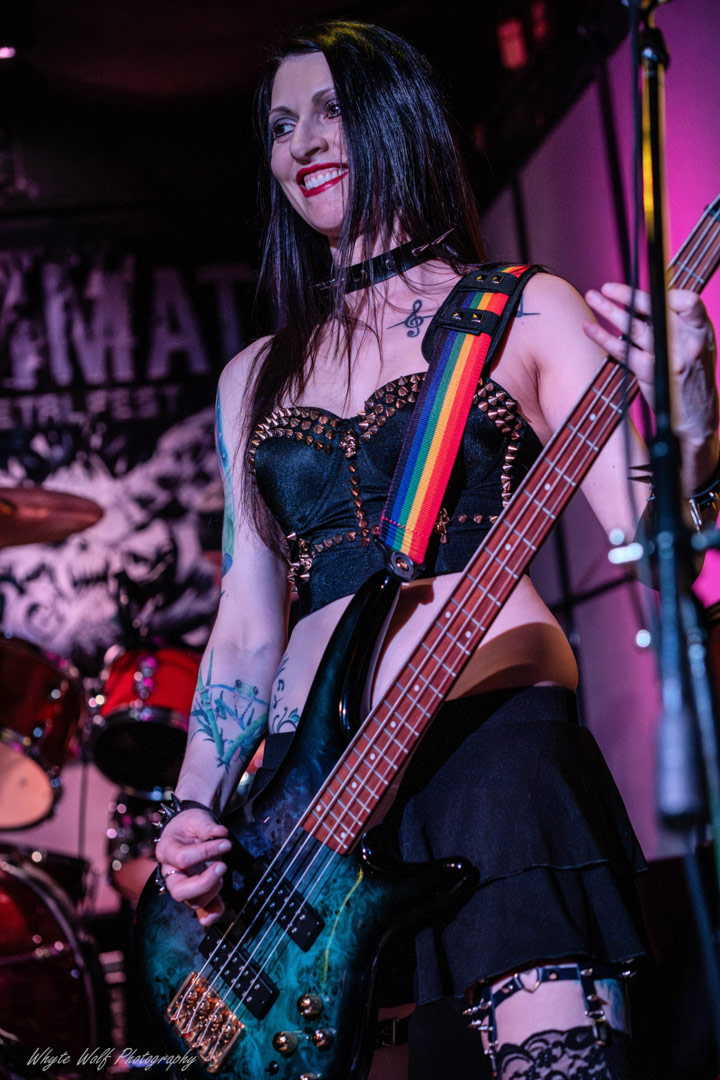 Lezzy Osbourne Smiling with her Ibanez Bass Guitar